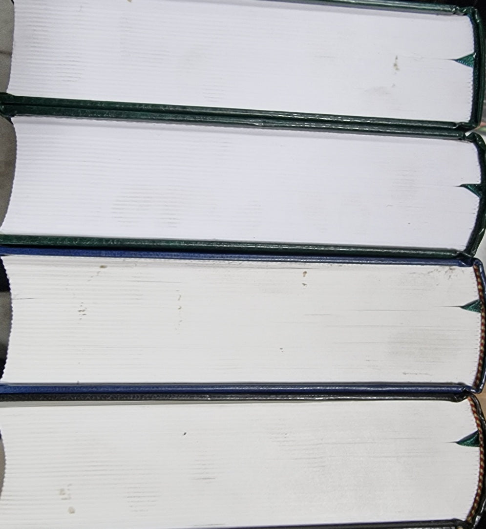 The Noble Quran Arabic/English Large (17x 24 CM)  marks on the edge