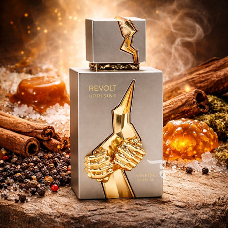 Perfume bottle labeled 'Revolt Uprising' with gold accents on a rustic background.